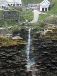 SX07260 Waterfall framed by Tintagel Castle medieval wall.jpg